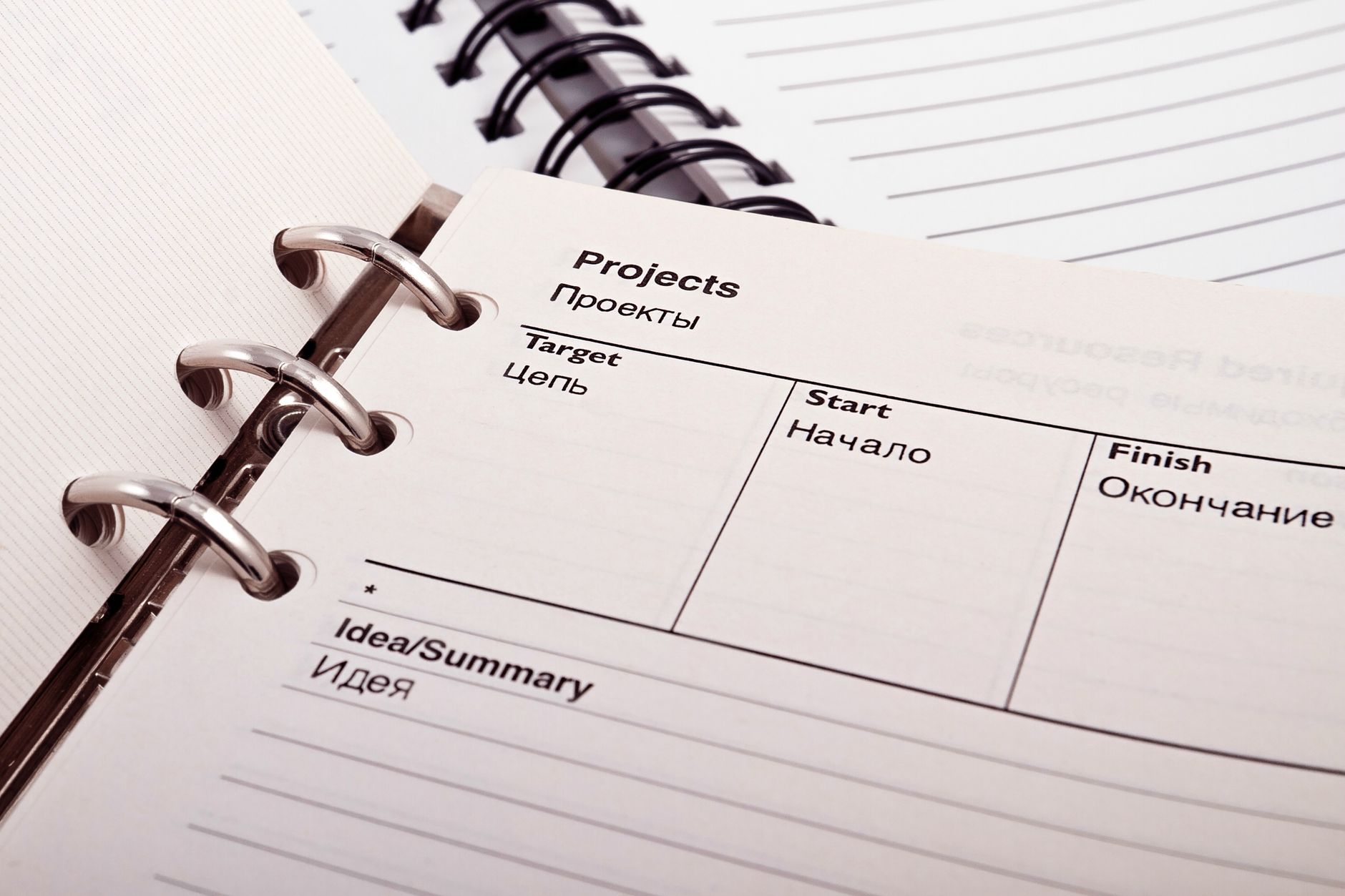 Open planner displaying project schedule, ideal for project scoping content.